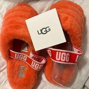 Almost new coral UGG slides
